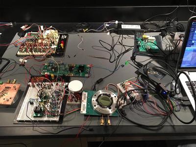 Electronics package under test with a Saleae logic analyzer
